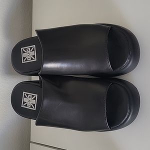 TUK black bubble platform sandals.